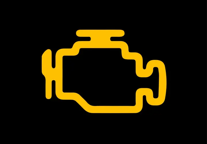 Żółty symbol silnika na czarnym tle. Migający check engine to znak, że coś jest nie tak z samochodem.