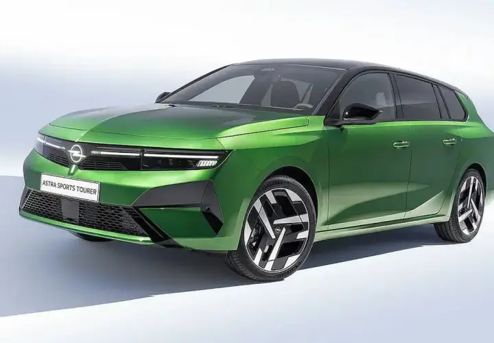 Nowy model Opla Astry Sports Tourer w jaskrawym zielonym kolorze, z czarnym dachem i futurystycznymi felgami.