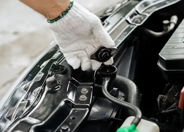 Uszkodzony korek chłodnicy objawy BMW – nie ignoruj tych sygnałów