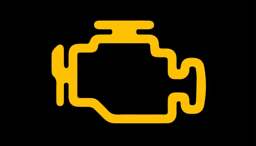 Żółty symbol silnika na czarnym tle. Migający check engine to znak, że coś jest nie tak z samochodem.