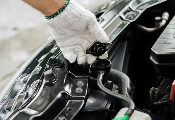 Uszkodzony korek chłodnicy objawy BMW – nie ignoruj tych sygnałów