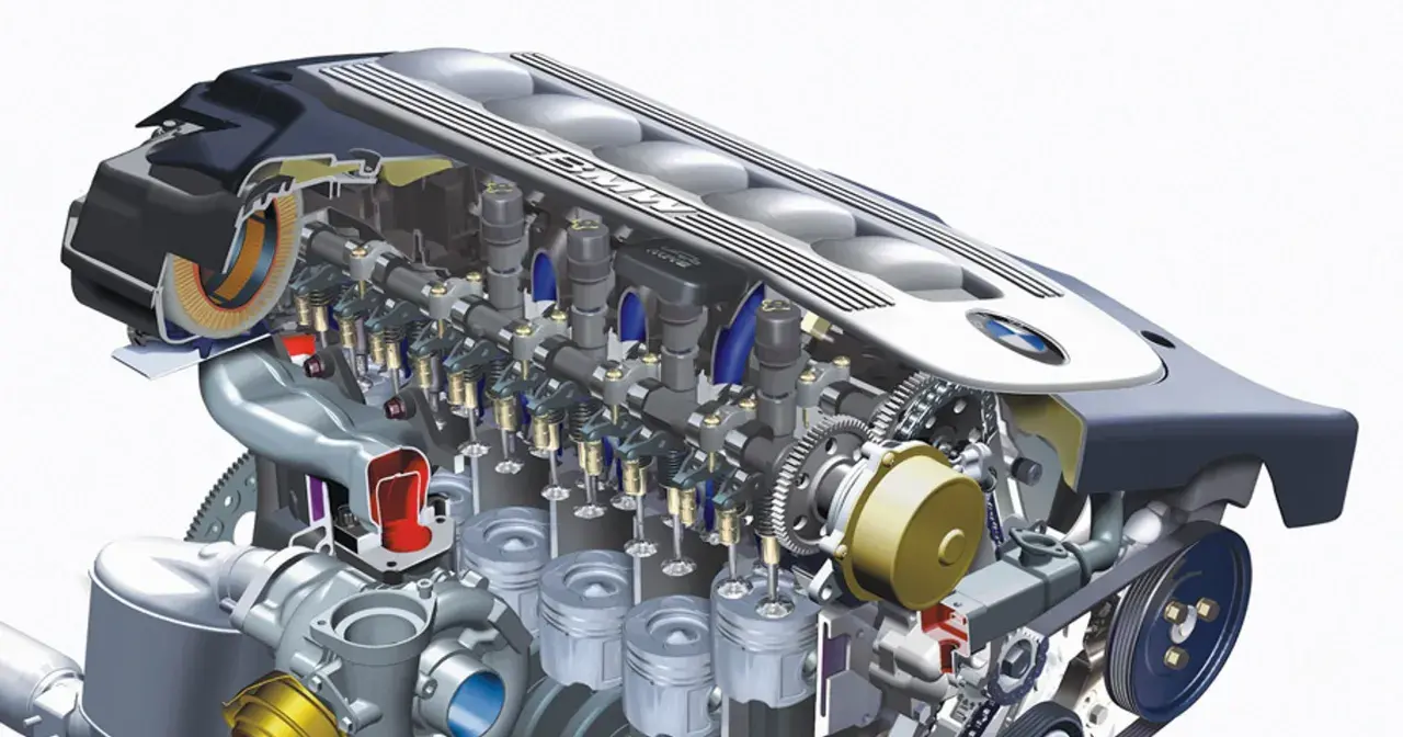 Przekrój silnika BMW M57N2 z widocznymi turbosprężarkami, tłokami i zaworami.
