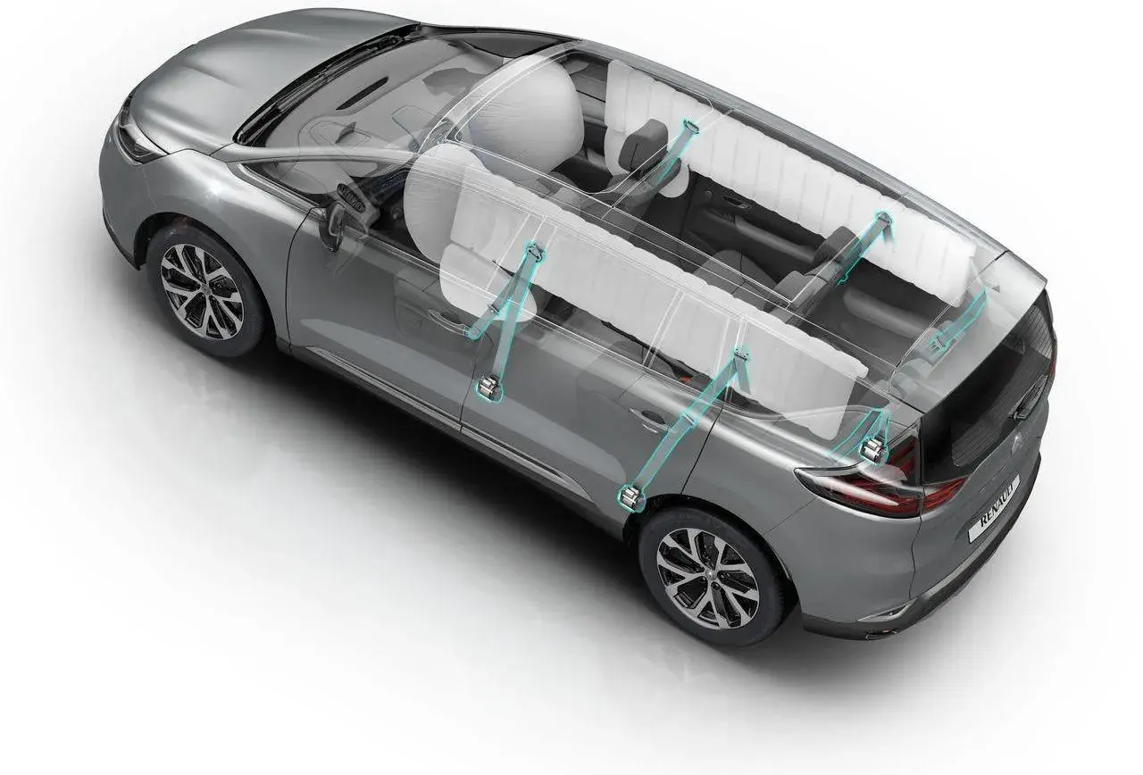 Renault Espace 2024 z widocznymi poduszkami powietrznymi i pasami bezpieczeństwa, podkreślającymi zaawansowane systemy ochrony pasażerów.